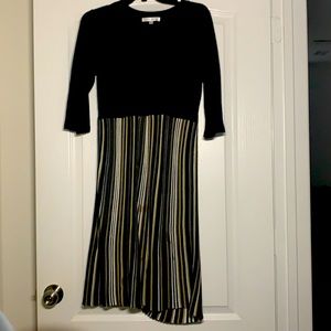 Cute dress. Kind of thick material